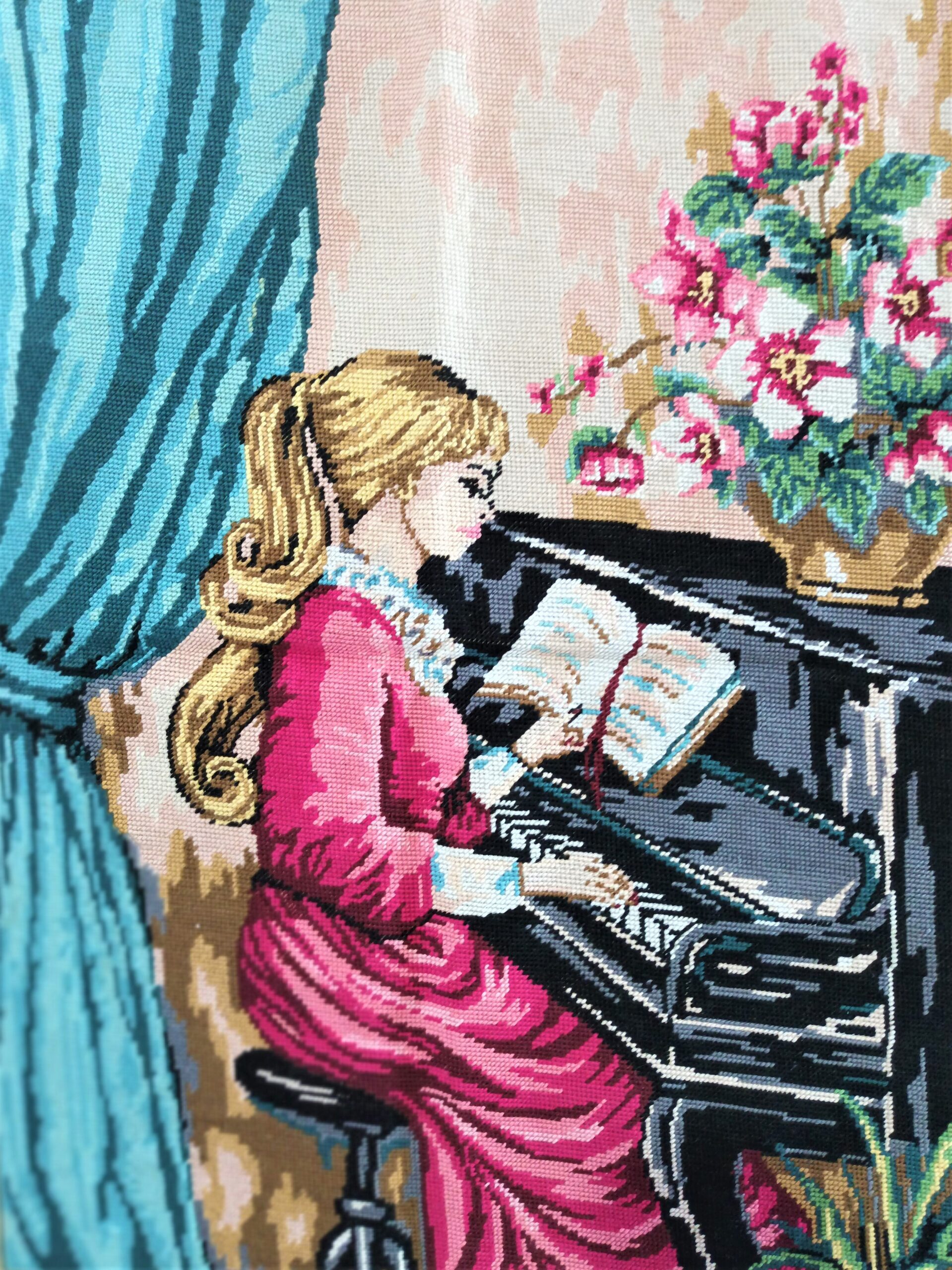 Big Embroidery frame showing a Girl with the piano. Handmade from Greece