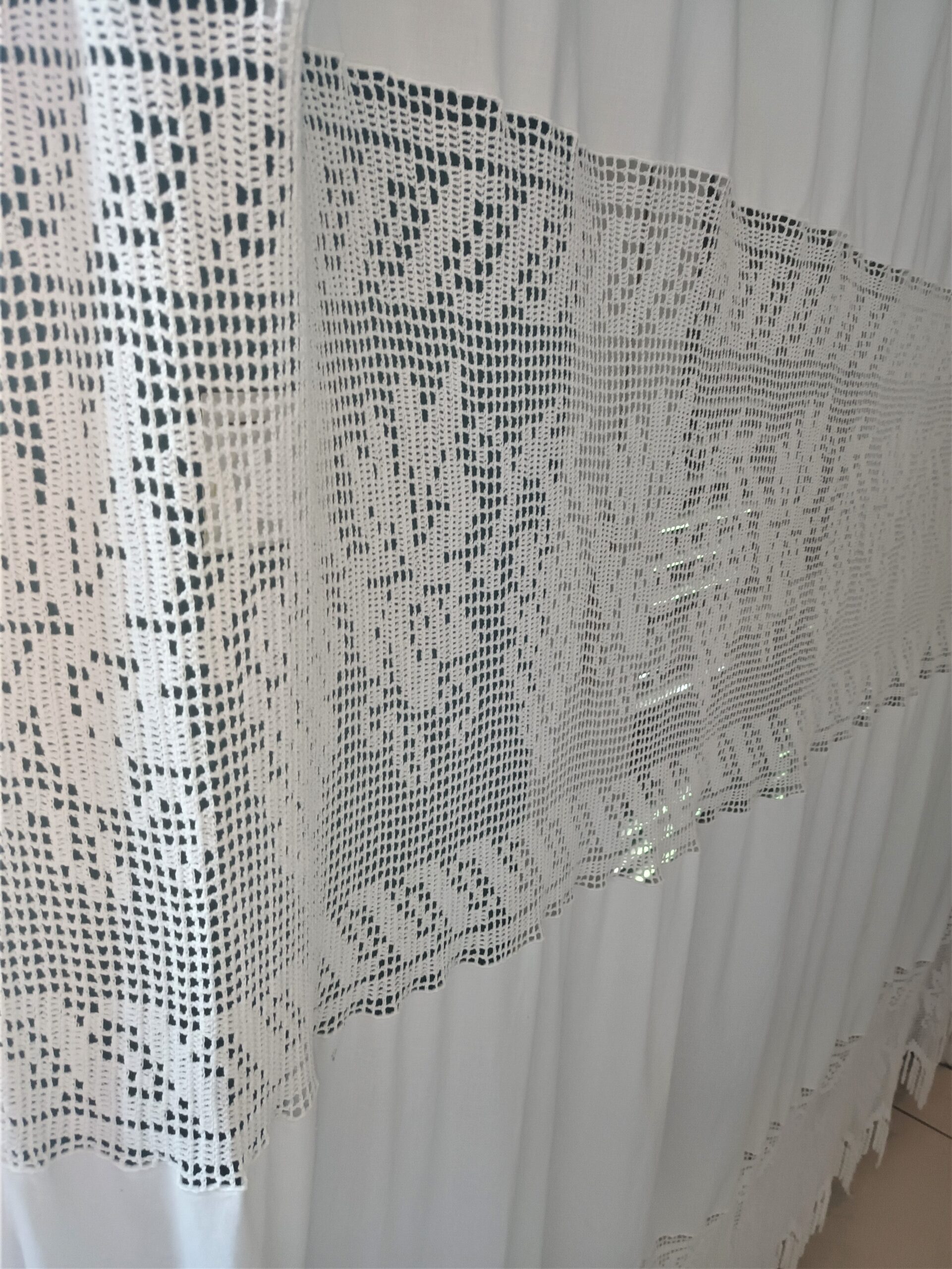 Big handmade curtain with cotton fabric and crochet in white. The pattern is grapes. At the bottom beautiful friges complete the style. Handmade artpiece from Greek woman. Suitable for double window in normal size.