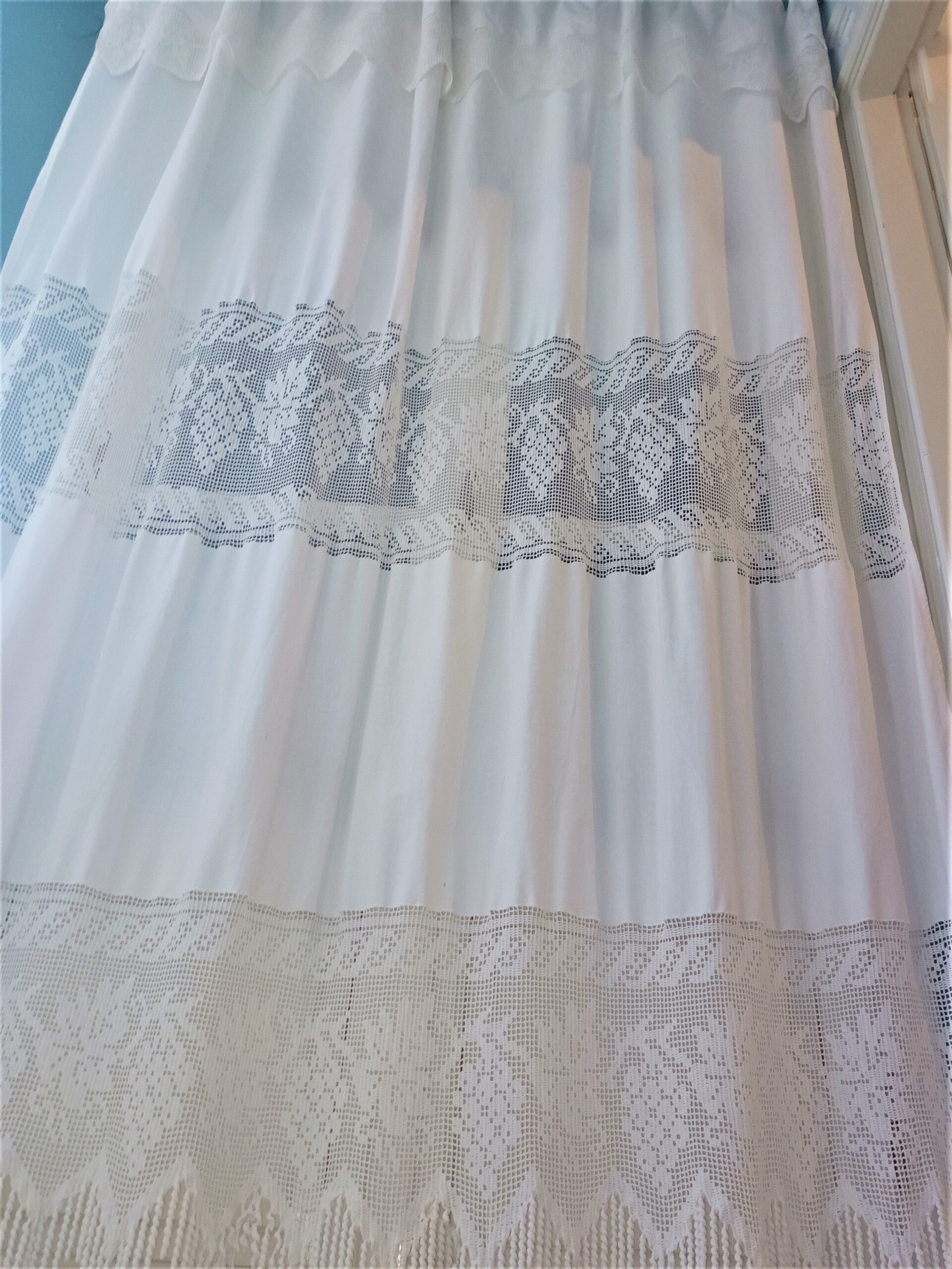 Big handmade curtain with cotton fabric and crochet in white. The pattern is grapes. At the bottom beautiful friges complete the style. Handmade artpiece from Greek woman. Suitable for double window in normal size.