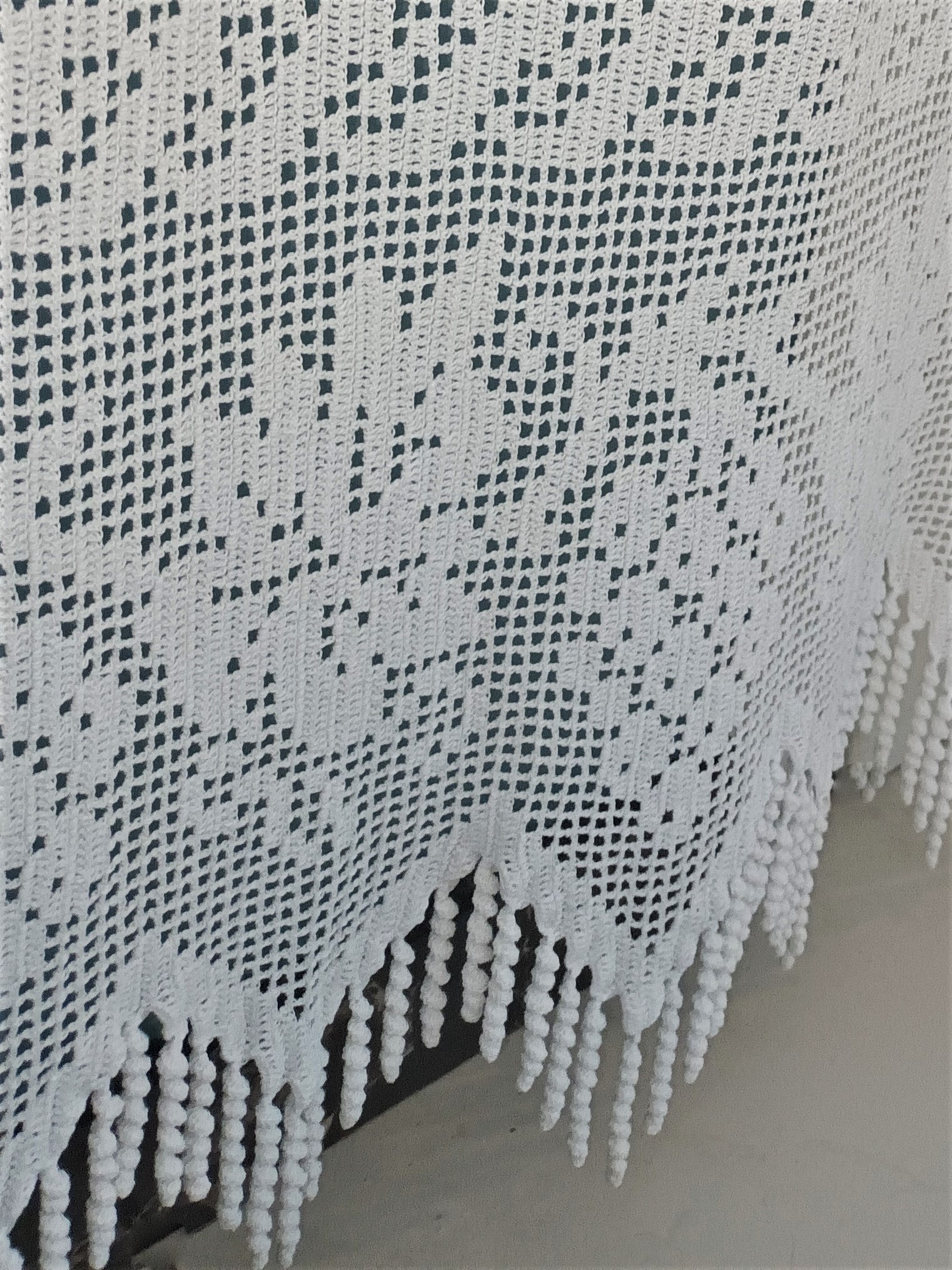 Big handmade curtain with cotton fabric and crochet in white. The pattern is grapes. At the bottom beautiful friges complete the style. Handmade artpiece from Greek woman. Suitable for double window in normal size.