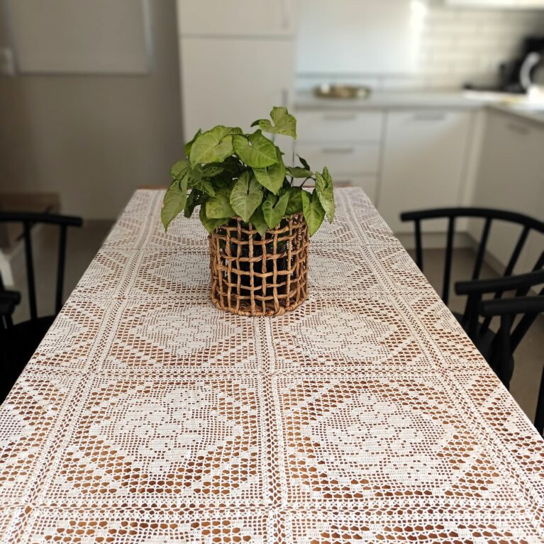 Tableclothe knitted with crochet in white 100% cotton thread. It is suitable for big dinning tables. Handmade from Greek woman
