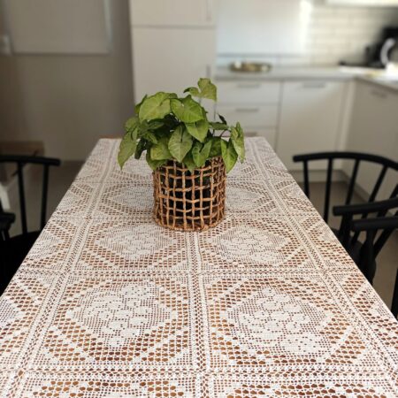 Tableclothe knitted with crochet in white 100% cotton thread. It is suitable for big dinning tables. Handmade from Greek woman