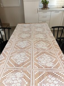 Tableclothe knitted with crochet in white 100% cotton thread. It is suitable for big dinning tables. Handmade from Greek woman