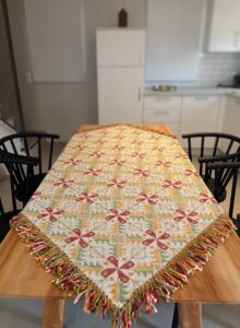 Tableclothe with embroidery and colorful fringes that makes it a very beautiful art piece from Greece. Suitable for big tables
