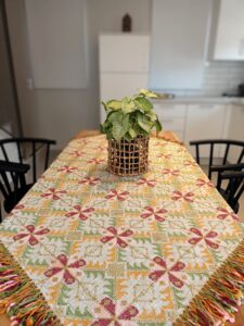 Tableclothe with embroidery and colorful fringes that makes it a very beautiful art piece from Greece. Suitable for big tables
